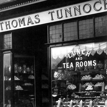 1924 Archie opens larger tearooms